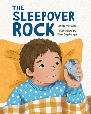 Book cover of 'The Sleepover Rock' with a boy holding a rock in a sleeping bag